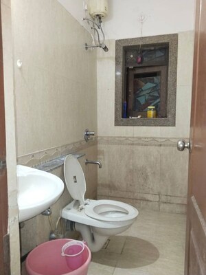 Bathroom in 3 BHK Apartment at Trishul Gold Coast, Ghansoli – for Rent