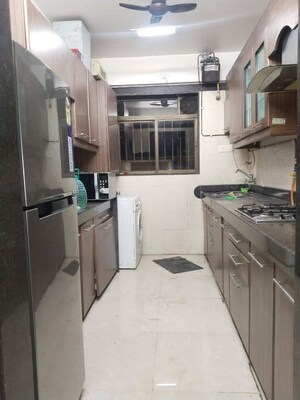 Kitchen in 3 BHK Apartment at Trishul Gold Coast, Ghansoli – for Rent