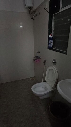 Bathroom in 1 BHK Apartment at Romell Orbis, Andheri East – for Rent