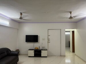Living Room in 2 BHK Apartment at Goyal Green Woods, Andheri East – for Rent