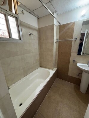 Bathroom in 3 BHK Apartment at Omaxe Grand Omaxe, Gomti Nagar – for Rent