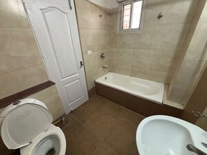 Bathroom in 3 BHK Apartment at Omaxe Grand Omaxe, Gomti Nagar – for Rent