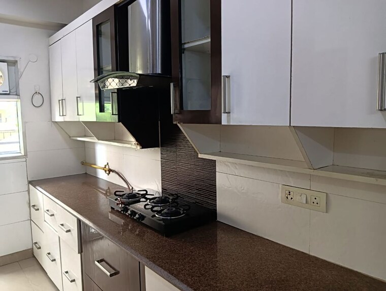 Kitchen, the-exotic-fresco 3.5 Bedroom 1877 Sq.Ft. Apartment In Sector 137 Noida 10717286