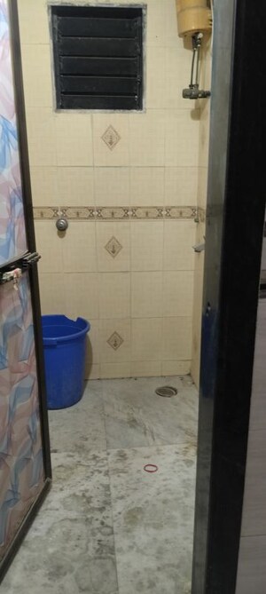 Bathroom in 1 BHK Apartment at Swami CHS Vashi, Juinagar – for Sale