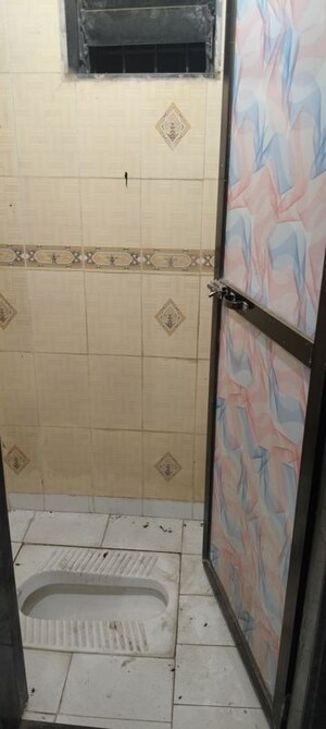 Bathroom in 1 BHK Apartment at Swami CHS Vashi, Juinagar – for Sale