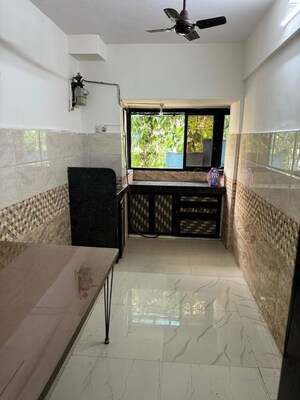 Kitchen in 2 BHK Apartment at Sea Breeze CHS Versova, Versova – for Rent