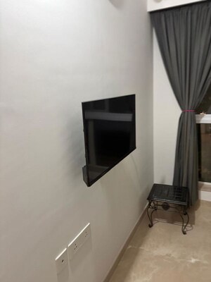 Living Room in 1 BHK Apartment at Godrej The Trees, Vikhroli East – for Rent