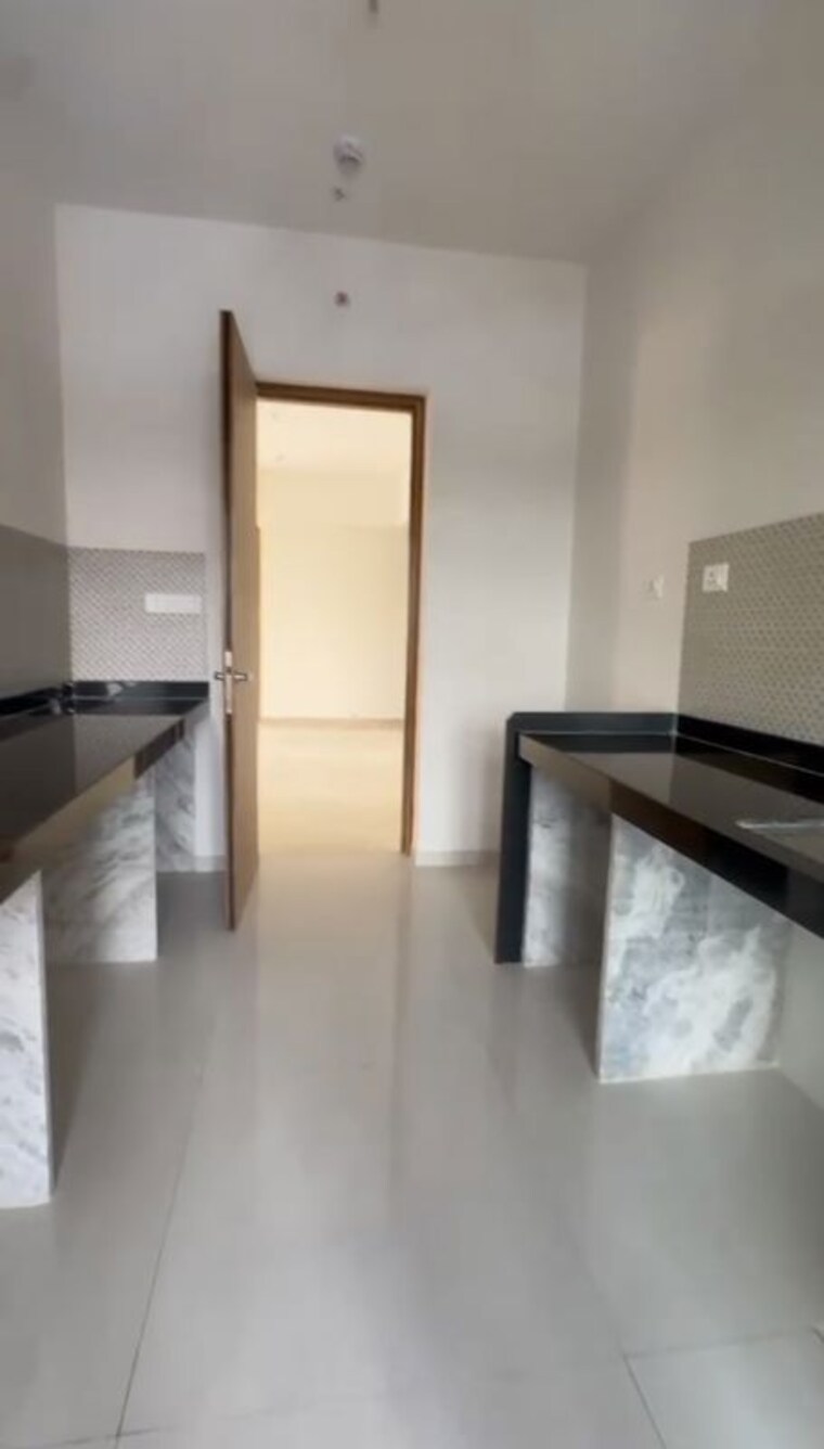 Kitchen, lodha-bellissimo 2.5 Bedroom 980 Sq.Ft. Apartment In Mahalaxmi Mumbai 10717473