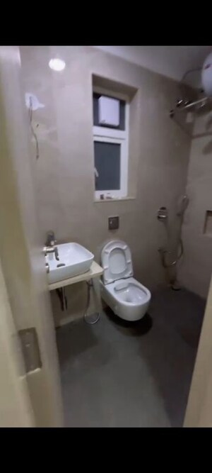 Bathroom in 2 BHK Apartment at Shree Sai D N Nagar Dwarka CHS, Andheri West – for Rent