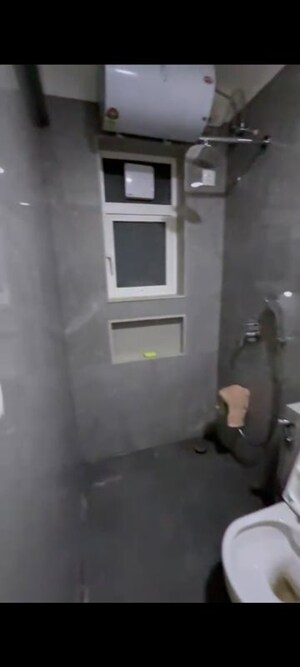 Bathroom in 2 BHK Apartment at Shree Sai D N Nagar Dwarka CHS, Andheri West – for Rent