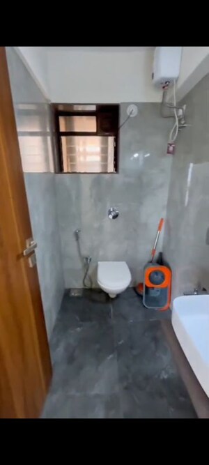 Bathroom in 3 BHK Apartment at Parijat CHS Andheri West, Yari Road – for Rent