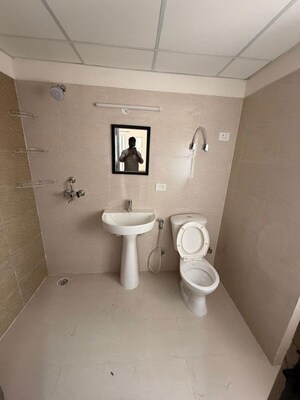Bathroom in 3 BHK Apartment at Sector 16c Greater Noida – for Rent