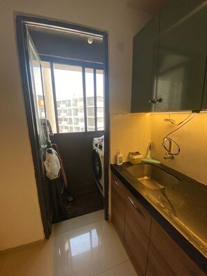 Kitchen in 1.5 BHK Apartment at Shapoorji Pallonji Joyville, Virar West – for Sale