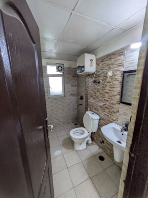 Bathroom in 3 BHK Apartment at Gardenia Golf City, Sector 75 – for Rent