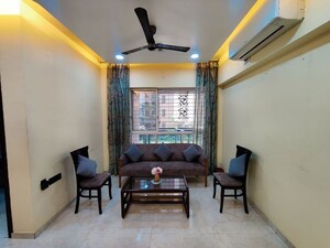 Living Room in 2 BHK Apartment at Lodha Amara, Kolshet Road – for Rent