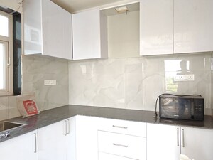 Kitchen in 3 BHK Apartment at Vasant Vihar – for Rent