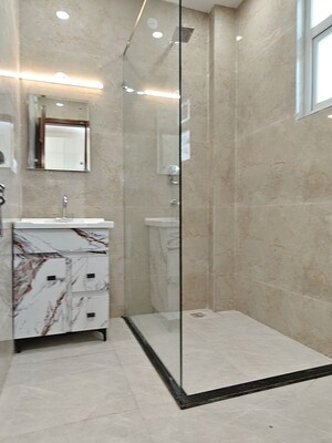 Bathroom in 3 BHK Apartment at Vasant Vihar – for Rent