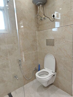 Bathroom in 3 BHK Apartment at Vasant Vihar – for Rent