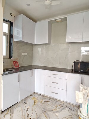 Kitchen in 3 BHK Apartment at Vasant Vihar – for Rent