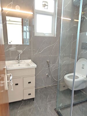 Bathroom in 3 BHK Apartment at Vasant Vihar – for Rent