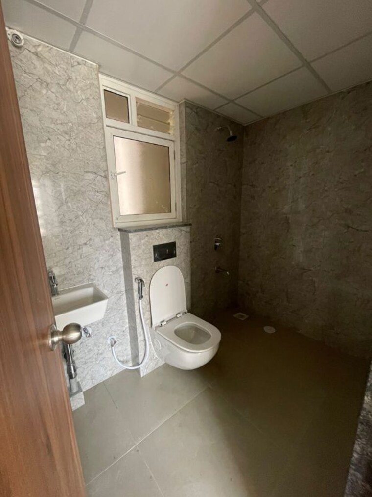 Bathroom, kolte-patil-life-republic-16th-avenue-arezo 2 Bedroom 649 Sq.Ft. Apartment In Hinjewadi Pune 10717763