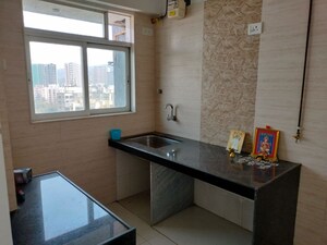 Kitchen in 1.5 BHK Apartment at Sanskruti Splendour, Dahisar East – for Sale
