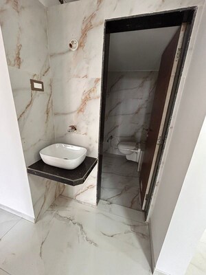 Bathroom in 2 BHK Builder Floor at Thanekar Palacio, Badlapur East – for Sale