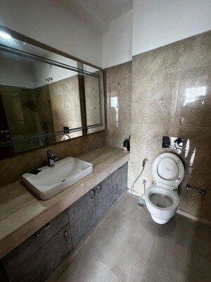 Bathroom in 4 BHK Apartment at M3M Golf Estate, Sector 65 – for Rent