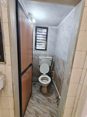 Bathroom in 1 BHK Apartment at Deepanjali CHS, Malad West – for Rent
