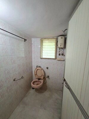 Bathroom in 1 BHK Apartment at Mhatre Palace Chs, Ic Colony – for Rent