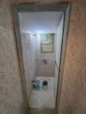 Bathroom in 1 BHK Apartment at Mhatre Palace Chs, Ic Colony – for Rent