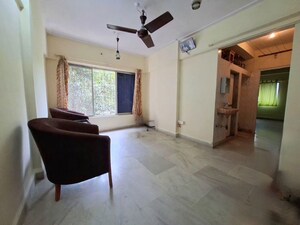Living Room in 1 BHK Apartment at Mhatre Palace Chs, Ic Colony – for Rent