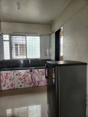 Kitchen in 2 BHK Apartment at G K Jarvari, Pimple Saudagar – for Rent