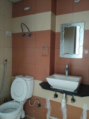 Bathroom in 3.5 BHK Apartment at Mahagun My Woods, Sector 16c Greater Noida – for Rent
