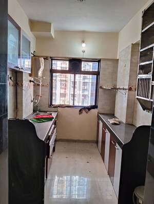 Kitchen in 2 BHK Apartment at Riddhi Siddhi Complex Goregaon, Goregaon West – for Sale