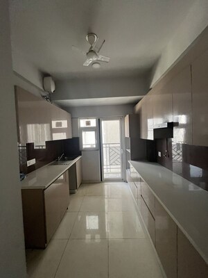 Kitchen in 3 BHK Apartment at Central Park Flower Valley Aqua Front Towers, Sohna Sector 33 – for Rent