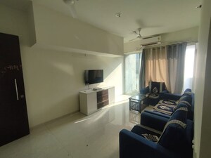 Living Room in 2 BHK Apartment at L And T Seawoods Residences, Seawoods – for Rent