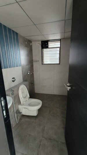 Bathroom in 3 BHK Apartment at Paranjape Azure, Tathawade – for Rent