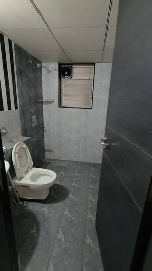Bathroom in 3 BHK Apartment at Paranjape Azure, Tathawade – for Rent