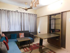 Living Room in 2 BHK Apartment at Nilanjana CHS, Malad West – for Rent