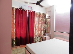 Bedroom in 2 BHK Apartment at Nilanjana CHS, Malad West – for Rent