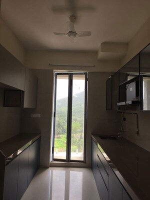 Kitchen in 2 BHK Apartment at USD Unique Vistas, Manpada – for Rent