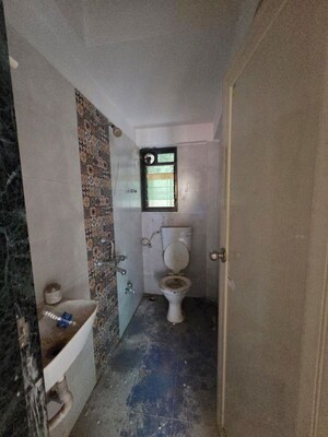 Bathroom in 1 BHK Apartment at Samarth Enclave, Andheri East – for Rent