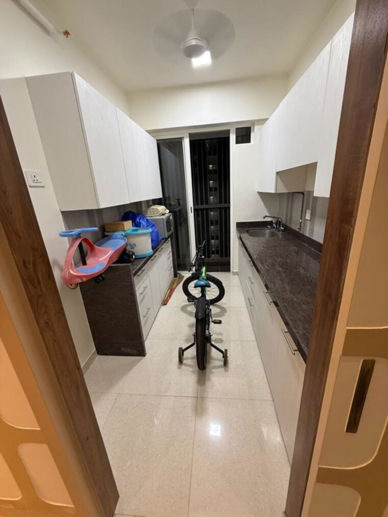 Kitchen, courtyard-by-narang-realty-and-the-wadhwa-group 2 Bedroom 542 Sq.Ft. Apartment In Pokhran Road No Two Thane 10718536