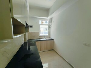 Kitchen in 2 BHK Apartment at Smart World Orchard, Sector 61 – for Rent