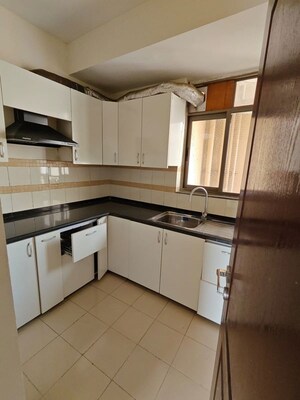 Kitchen in 3 BHK Apartment at Unitech Uniworld Gardens 2, Sector 47 – for Rent