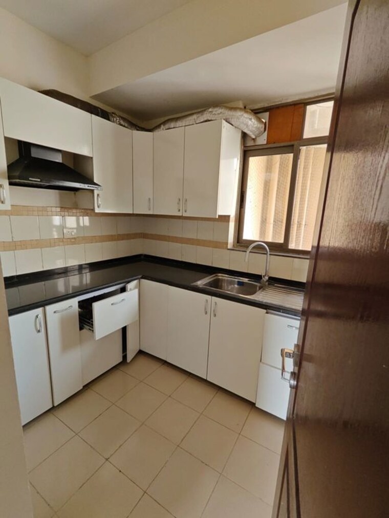 Kitchen, unitech-uniworld-gardens-2 3 Bedroom 1355 Sq.Ft. Apartment In Sector 47 Gurgaon 10718774