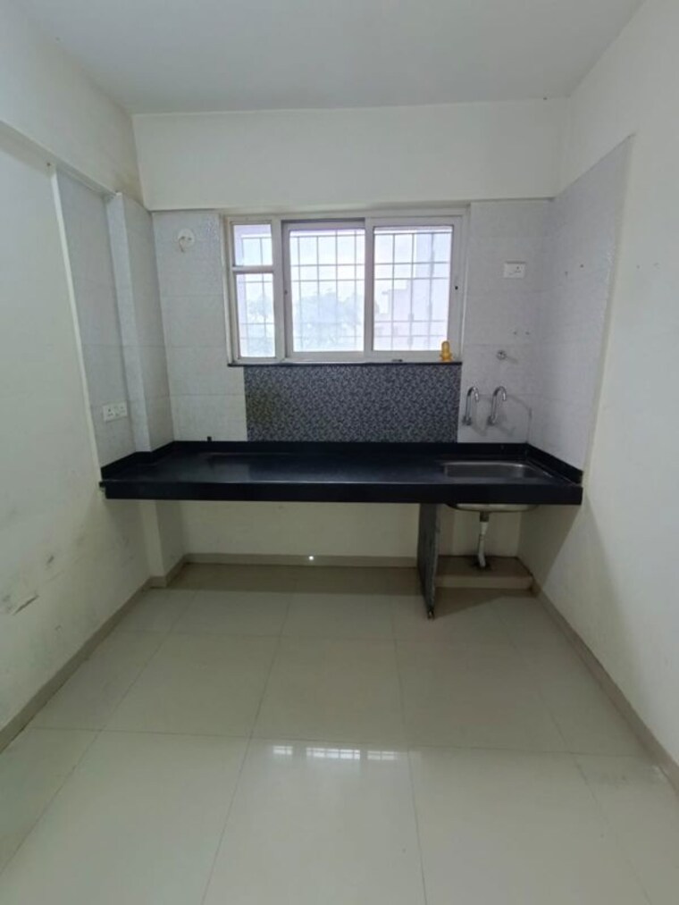 Kitchen, aalia-ace-aurum-ii-phase-1 1 Bedroom 700 Sq.Ft. Apartment In Ravet Pune 10718789