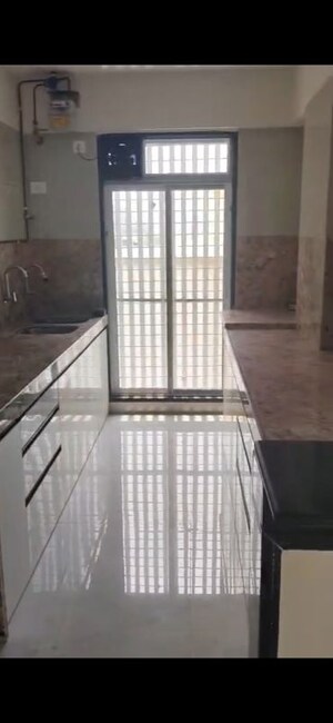 Kitchen in 2 BHK Apartment at Shiv Pearl Gardens, Malad West – for Rent
