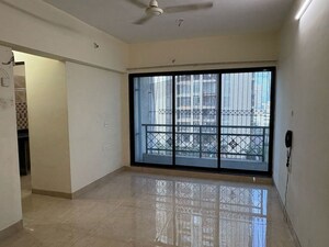 Living Room in 2 BHK Apartment at Tulsi Aura Mumbai, Ghansoli – for Rent